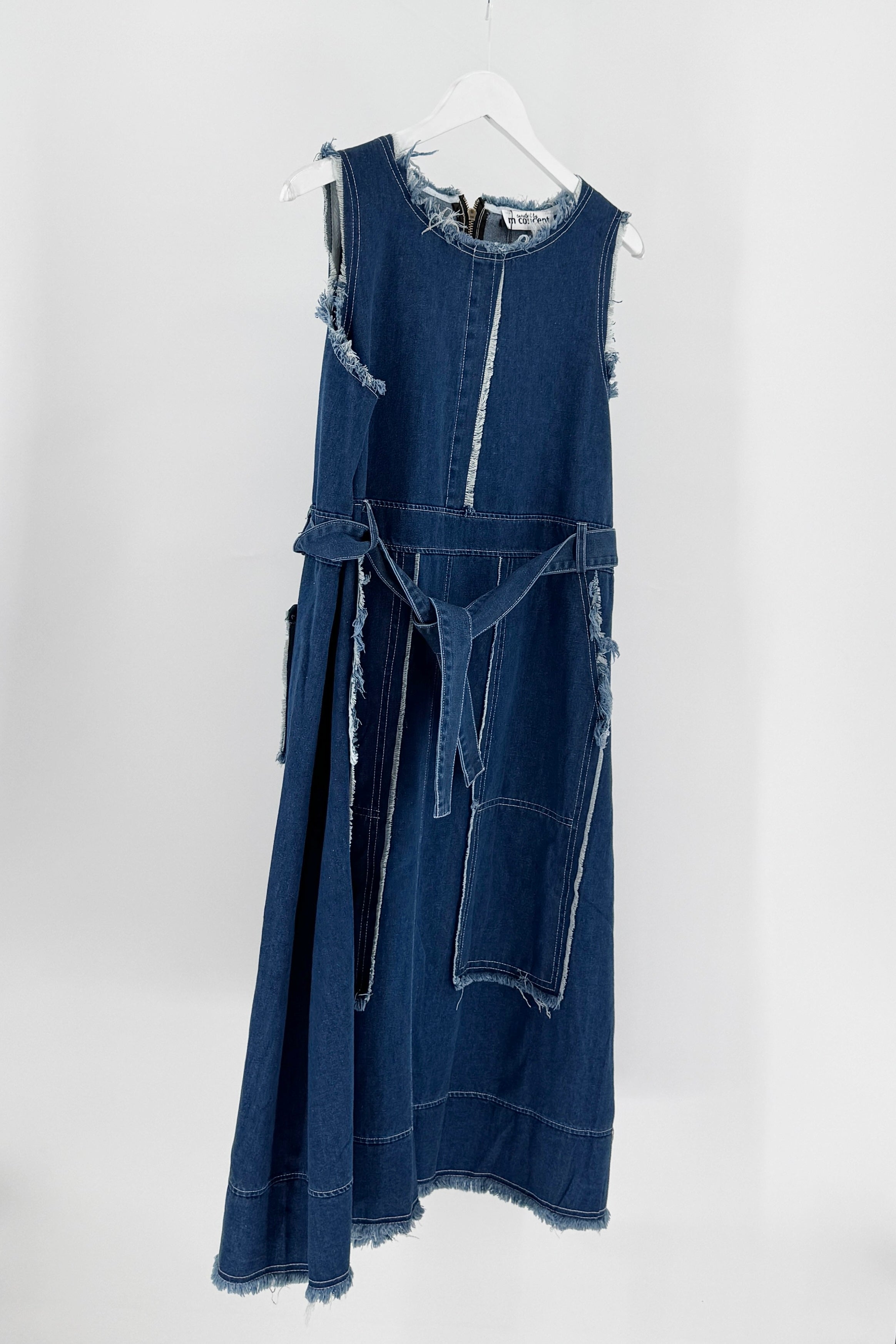 Blue denim dress on a white background