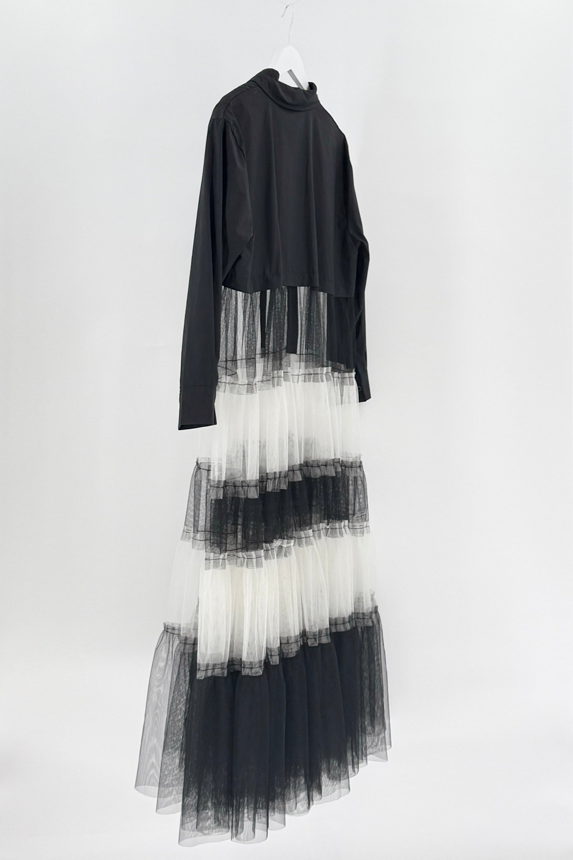 Black and white layered dress on a white background