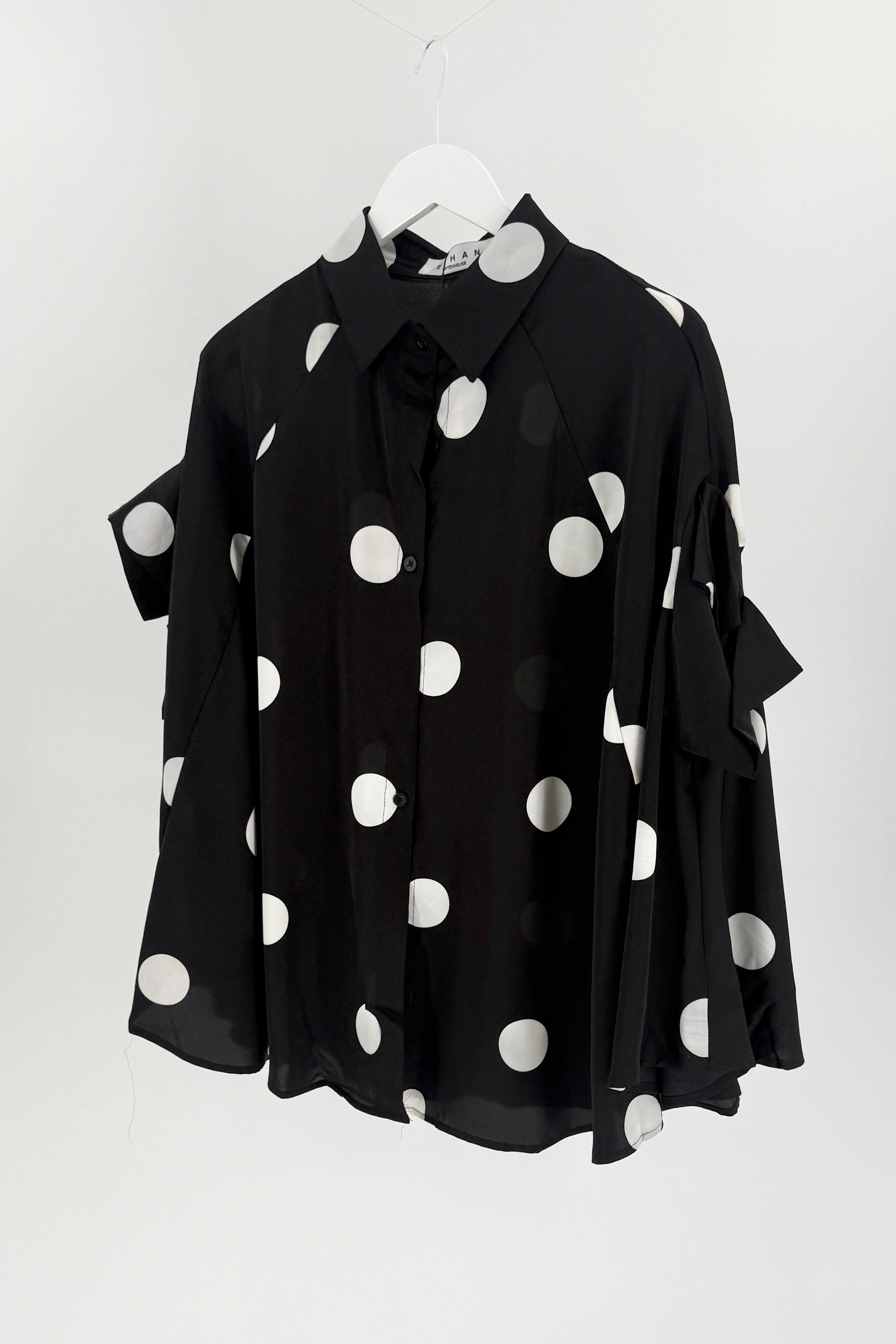 White polka dot on black short sleeve button down. 