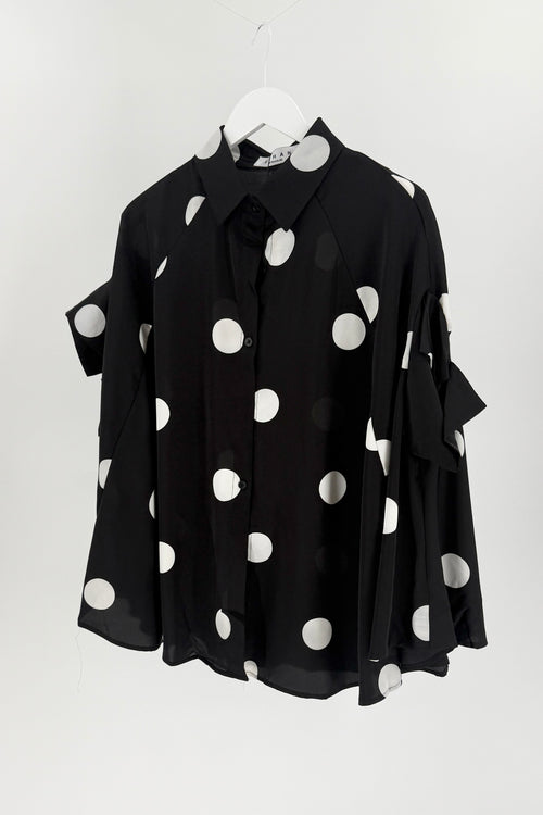 White polka dot on black short sleeve button down. 